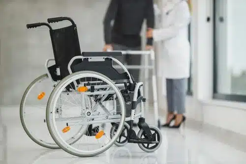 Hospital staff locating tagged medical equipment with an RTLS in a healthcare facility